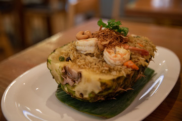 pineapple filled with rice and seafood