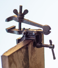 Old rusty vise for metal products