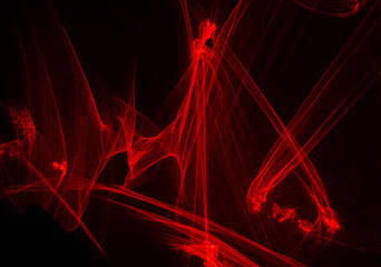 Abstract lines drawn by light on a black background.