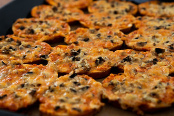 homemade hot sandwiches cooked with hands with different fillings lie in a protvin,quick sandwiches at home,fast food at home,vegetarian and meat sandwiches on one tray