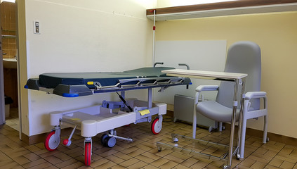 Empty stretcher trolley, special bed in hospital room