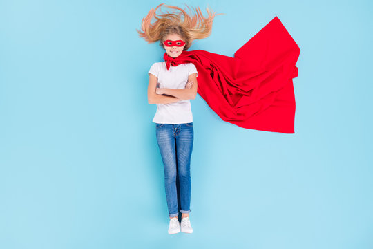 Top above high angle view full length photo of positive super girl cross hands ready save world wear denim white red cape mask lay isolated over blue color background