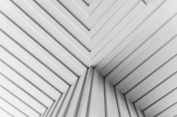 Obraz premium High resolution white abstract background for graphic design, application design.Volume diagonal lines.Soft convex wall panels, in light gray leather. High quality seamless realistic texture.