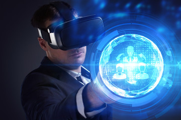 Business, Technology, Internet and network concept. Young businessman working on a virtual screen of the future and sees the inscription: