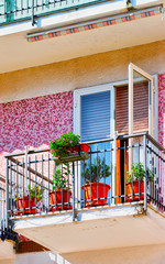 Balcony of house with flowers at Agerola reflex