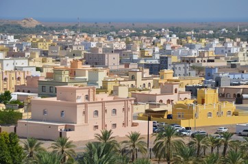 Colorful traditional arabian cubic houses in Omani town