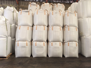 White jumbo sack Large quantities of large quantities of chemical fertilizer sugar rice waiting for delivery to customers.