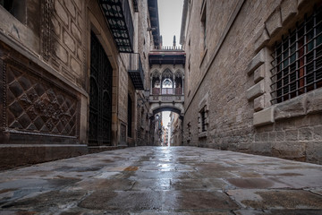 Barcelona, Catalonia / Spain: 04 09 2020: empty streets in the Bisbe street, in the Gothic Quarter in the city of Barcelona during the covid-19 coronavirus pandemic