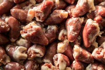 A lot of raw chicken hearts