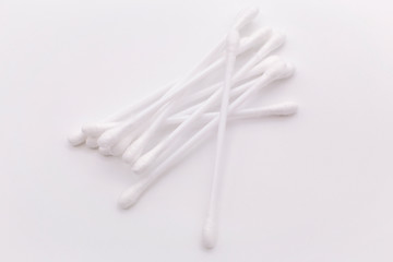 Hygiene products. White ear sticks on a white background.