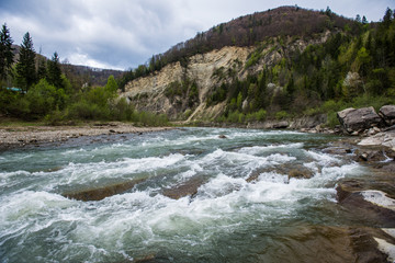 
beautiful mountain river with fast flowing water