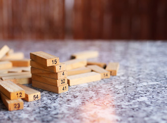 wooden blocks with numbers for playing on the table