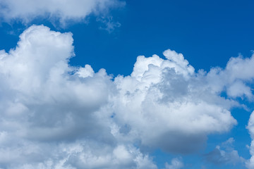 Naklejka na ściany i meble White cloud on blue sky on day time for background.