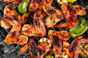 grilled chicken wings and vegetables