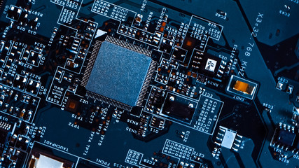 Macro Close-up Shot of Microchip, CPU Processor on Printed Circuit Board / Computer Motherboard...