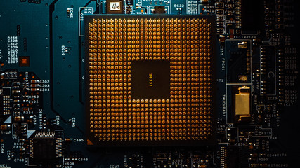 Macro Close-up Shot of CPU Processor Socket on Printed Circuit Board or Computer Motherboard with Components Inside of Electronic Device, Parts of Supercomputer.
