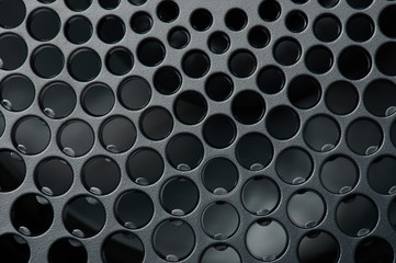 Naklejka premium Perforated black matte surface