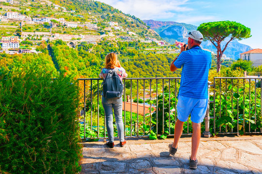 People taking photos at terrace in Ravello village reflex
