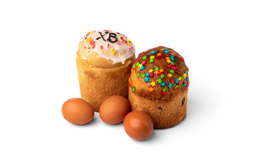 Easter cakes and eggs isolated on white background.
