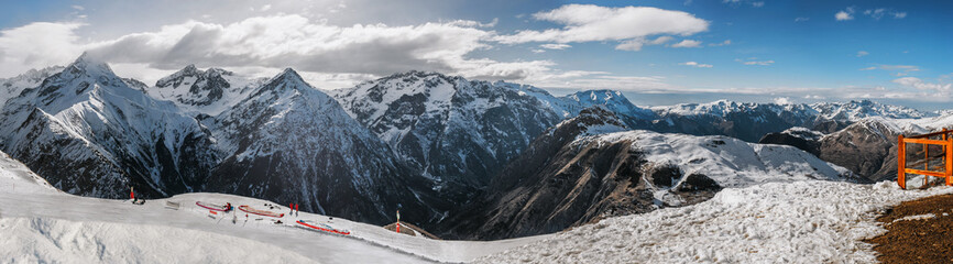 The grandiose and amazing panoramic view of freeze mountain range Alpes landscape scene from the...