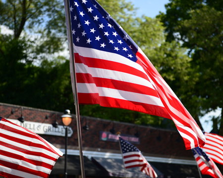 Low Angle View Of American Flags In Parade