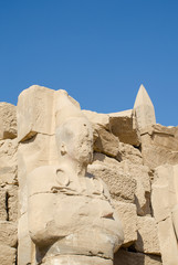 Ancient Egyptian art. Sculpture and obelisk in the Karnak Temple.