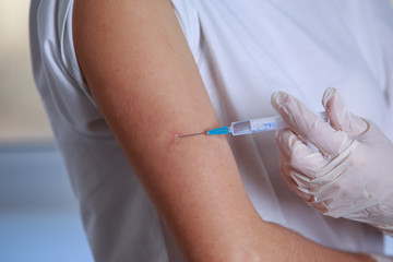 Tuberculosis shoulder vaccination