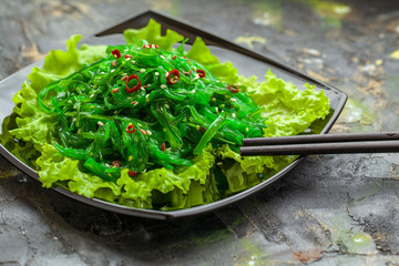 Chuka salad, Seaweed food salad with sesame and lemon, closeup