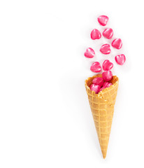 Heart shaped sweets in a waffle cone isolated on white
