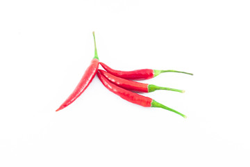 Close up pile of chilli peppers isolated on white background, for food ingredient 