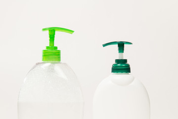 Liquid soap dispensers with green pumps