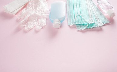 Obraz na płótnie Canvas protective medical mask, sanitizer gel and gloves. protective measures against virus, bacteria