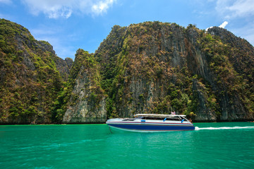 Beautiful mountain in the sea with boat at Krabi ,South of Thailand
