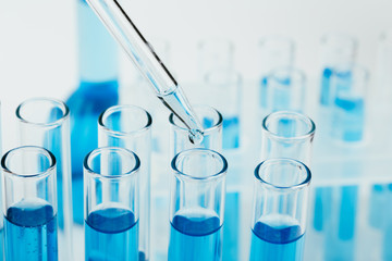 A pipette that adds fluid to one of several tubes. Lab tests