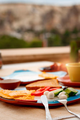 Breakfast on the balcony overlooking the mountain.