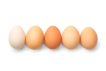a lot of chicken eggs on a white background