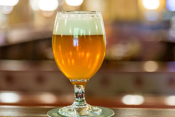 Glass of beer in old pub
