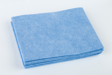 Kitchen rag for cleaning blue color on an isolated background.