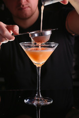 Fresh cocktail drink on dark background