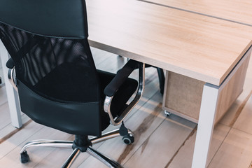 office chair near the desktop with office. new workplace concept