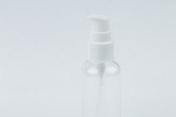 Empty Clear Bottle isolated on white background. Cosmetic. Spa.