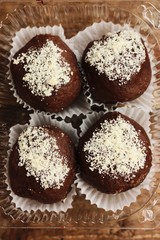 Delicious chocolate cakes on the table macro