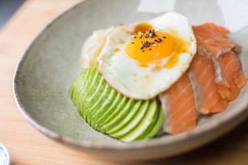 Salmon donburi with avocado and egg