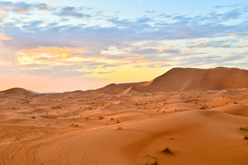 Fototapeta na wymiar Beautiful sunset over Sahara desert sand dunes in Morocco, Africa