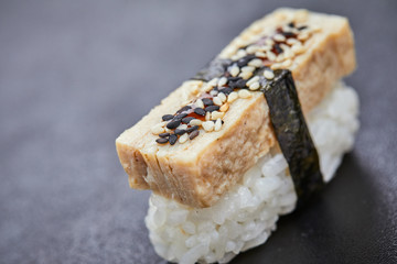 sushi on the black background