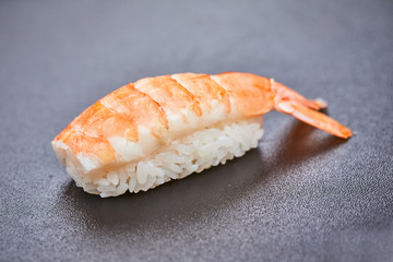 sushi on the black background