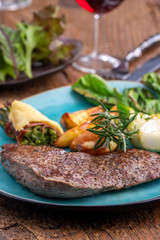 steak on a plate with vegetables
