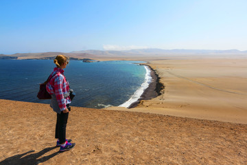 A traveller at the Paracas National Reserve in Peru South America - Peru