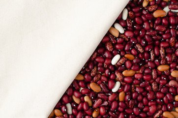 beans on linen background with copy space. Two types of linen. Beans background. Cloth.