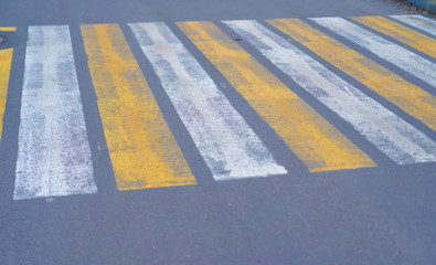 Pedestrian crossing on the road with cars